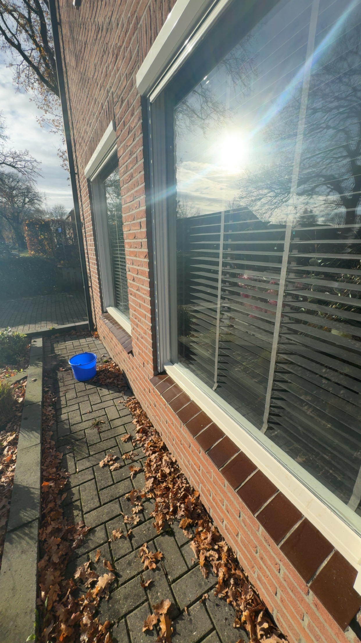 GoldenClean aan het werk - ramen wassen